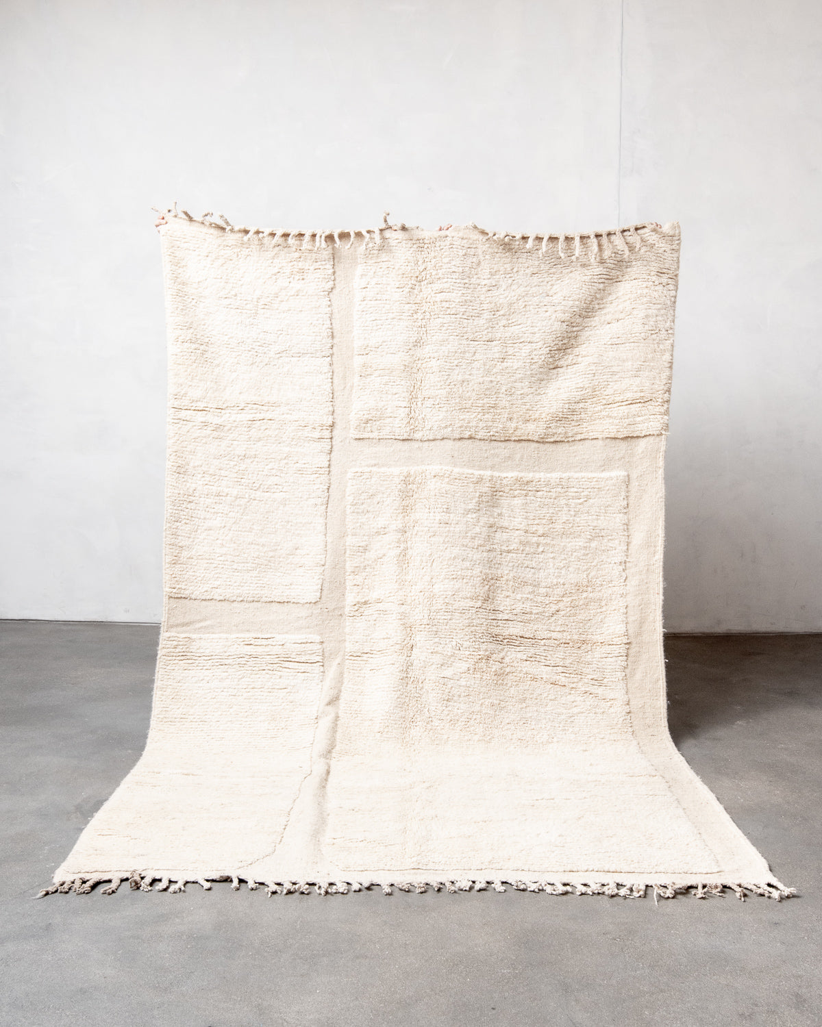 Modern, designer, handcrafted Berber rug from Morocco. Beniourain carpet with beautiful colours and patterns and fluffy wool texture.